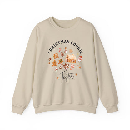 Beige sweatshirt with Christmas-themed graphics and text on a white background