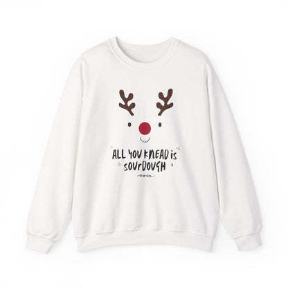 White sweatshirt with a reindeer face design and text on a white background